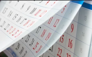Calendar with red and black dates