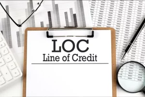 a clipboard reading LOC line of credit